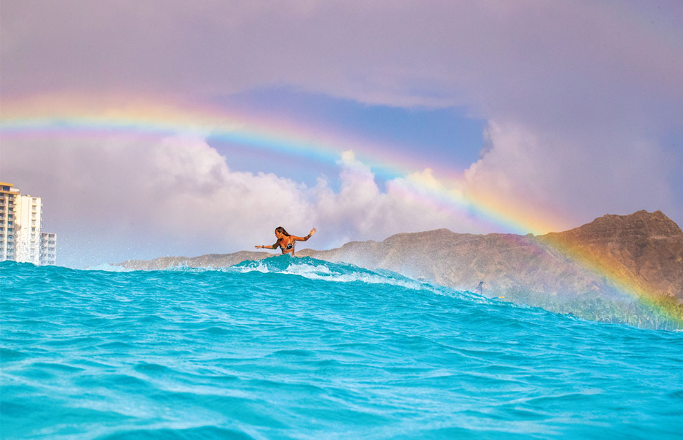 a person surfing on a wave