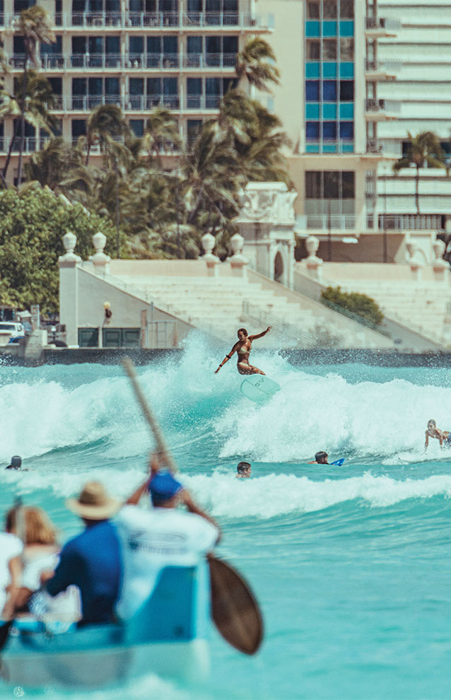 a person surfing on a wave