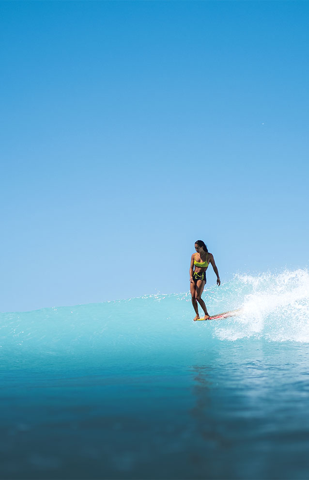 a person surfing on a wave