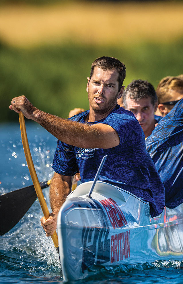 group of men in a canoe