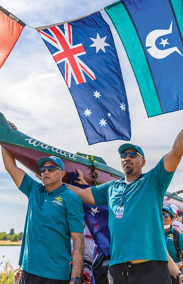 a group of men holding flags