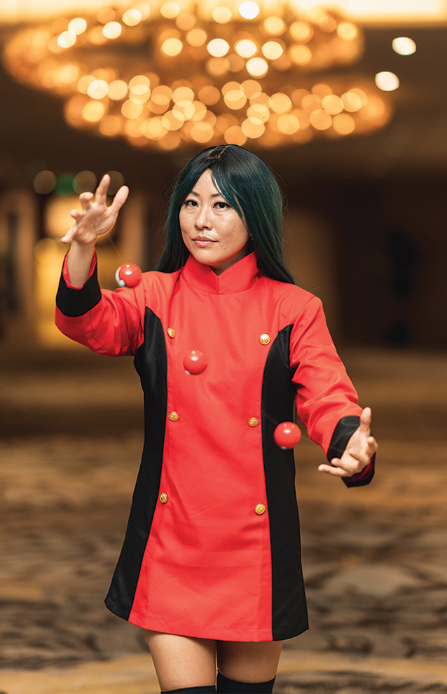 a person in a red and black red dress