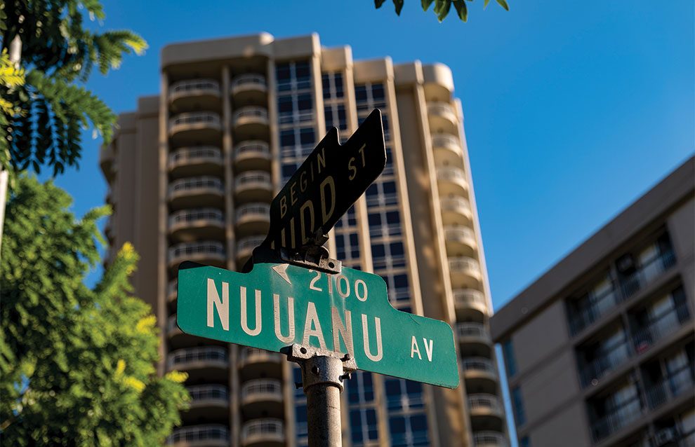 a street sign in front of a building