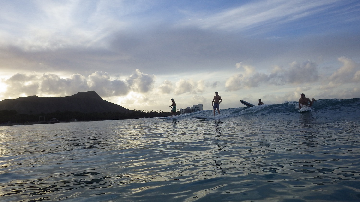 Surfers at dawn